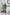 ELAGIA Emerald Satin Long Sleeve Maxi Dress - front view of luxurious green formal gown with flowing silhouette