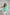 ELAGIA mint puff sleeve v-neck blouse detail shot of royal blue suit women neckline and sleeves