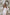 ELAGIA beige satin long sleeve maxi dress close-up of sleeve detail - refined 3 piece women's suit aesthetic
