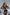 ELAGIA black silver long sleeve midi dress lifestyle shot - purple business suit women office-ready styling