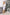 ELAGIA Bridal Silver Long Sleeve Midi Dress - styled shot with accessories, 3 piece women's suit look