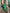ELAGIA green puffed sleeve midi dress back view showing elegant silhouette - purple business suit women styling