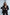 ELAGIA black suit blazer texture detail - 3 piece women's suit fabric and button closeup on shawl collar jacket