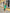 ELAGIA Green One-Shoulder Satin Midi Dress - model wearing dress showcasing 3 piece women's suit elegance