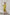 ELAGIA yellow-green wrap midi dress back view showing elegant draping and purple business suit women styling
