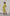 ELAGIA yellow-green wrap dress detail shot highlighting long sleeves and 3 piece women's suit aesthetic