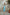 ELAGIA light blue suit women's professional wear showing midi skirt length and sleeveless top fit