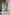 ELAGIA Sky-Blue Suit lifestyle shot on model in office setting - 3 piece women's suit workplace fashion