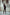 ELAGIA black shawl lapel suit back angle showing blazer drape and trouser cut for office wear