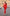 Close-up of ELAGIA red blazer button detail and lapel construction on women's business suit
