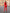 ELAGIA red 2-piece suit styled with accessories showing complete professional women's outfit look
