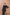 ELAGIA black thigh-slit maxi dress close-up of fabric texture and 3 piece women's suit construction details