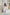 ELAGIA ivory puff-sleeve midi dress lifestyle shot - purple business suit women inspired professional dress option