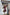 ELAGIA Bordeaux Puff-Sleeve Midi Dress hemline detail showing 3 piece women's suit midi length proportions