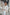 ELAGIA white puff-sleeve midi dress sleeve detail close-up - part of 3 piece women's suit collection