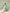 ELAGIA mint puff sleeve top detail shot of v-neckline and collar - light blue suit women business attire