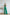 ELAGIA emerald satin wide-leg jumpsuit side angle view - emerald green jumpsuits profile silhouette