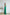 ELAGIA emerald satin wide-leg jumpsuit fashion styling - emerald green jumpsuits editorial presentation
