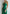 ELAGIA emerald green jumpsuit front view - satin wide-leg blue jumpsuit with elegant silhouette