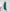 ELAGIA Emerald Puff Sleeve Wrap Dress - model wearing dress in professional setting