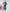 ELAGIA Emerald Puff Sleeve Wrap Dress - fabric drape and movement detail shot