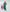 ELAGIA Emerald Puff Sleeve Wrap Dress - three-quarter view showing purple business suit women styling