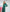 ELAGIA Emerald Puff Sleeve Wrap Dress front view - 3 piece women's suit style in green wrap silhouette