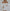 ELAGIA white puffed sleeve mini prom dress - waist detail emphasizing 3 piece women's suit tailoring