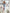 ELAGIA grey satin puff-sleeve midi dress back view showing zipper detail - 3 piece women's suit business style