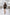 ELAGIA black v-neck bell sleeve mini dress front view - retro-inspired women's dress with flared sleeves