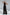ELAGIA Black Cross-Neck Sleeveless Jumpsuit detail shot, womens black suit crossover neckline close-up