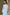 ELAGIA white one-shoulder belted midi dress styled look with accessories and complete outfit coordination
