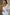 ELAGIA white one-shoulder belted midi dress close-up of belt detail and waist cinching design