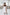 ELAGIA white high waist slit cuff culottes - full body shot showcasing white suit for women silhouette