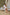 ELAGIA white satin one-shoulder cut-out midi dress fabric detail shot - 3 piece women's suit silhouette