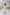 ELAGIA beige one-shoulder satin midi dress lifestyle shot - 3 piece women's suit aesthetic asymmetrical dress