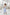 ELAGIA Alexa White Formal Crop Top - flat lay styling of womens white suit top with professional accessories