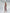 ELAGIA Beige Long Sleeve Top & Maxi Skirt 2-Piece Set front view - 3 piece women's suit womens red suit set