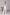 ELAGIA Monika white jumpsuit full length styled shot - versatile white suit for women ensemble