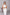 ELAGIA Monika backless jumpsuit close-up waist detail - refined womens white suit style tailoring