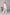 ELAGIA Monika jumpsuit fabric texture detail view - luxurious womens white suit material finish