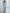 ELAGIA sky-blue satin long sleeve dress fabric close-up - 3 piece women's suit texture detail