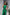 ELAGIA Monika Green Backless Jumpsuit - styled full body shot of green business suit on model