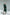 ELAGIA Emerald Puff Sleeve Wrap Dress - back view showing wrap detail and puff sleeves