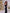 ELAGIA Black Satin Puff-Sleeve Midi Dress on model walking, purple business suit women confidence and movement