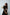 ELAGIA Black Backless Puff-Sleeve Midi Dress full length view styled as purple business suit women ensemble