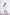 ELAGIA ivory off-the-shoulder mini dress side angle detail with 3 piece women's suit styling elements