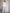 ELAGIA white 3 piece women's suit side angle showing tailored blazer, matching vest and trouser silhouette