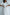 ELAGIA white backless puff-sleeve midi dress three-quarter view highlighting silhouette and 3 piece women's suit style