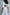ELAGIA white backless puff-sleeve midi dress detail shot of fabric texture with purple business suit women aesthetic